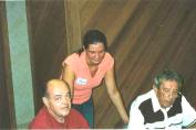 At our July 24, 2003 Friends of OLA meeting, from Left are: John Molitor, survivor of room 209; Karen Raymond, granddaughter of the late James Raymond, OLA janitor; and Father Joseph Ognibene, former OLA paster who helped save many children in room 209 from certain death. (Photo courtesy of Charlene Jancik)
